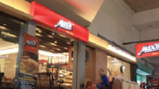 The first Max’s Restaurant franchised store opens in Harrison Plaza.